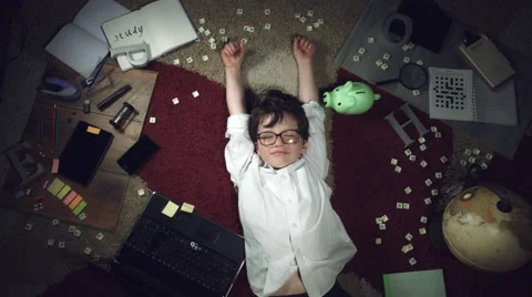 4k Above School Background of a Child Lying Tired Stock Footage