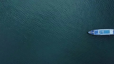 4k Above view of ship sails on sea outdoors irrl. Stock Footage 219894463