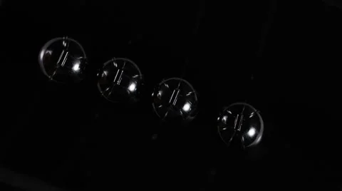 4K Abstract angle of Newton's cradle spheres in slow motion Stock Footage 67173294