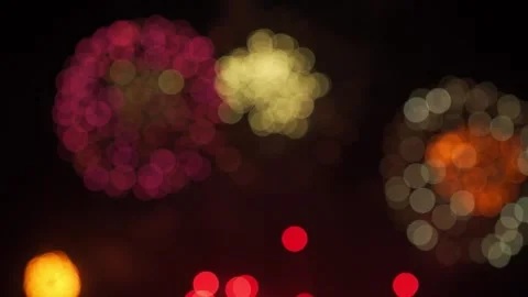4K Abstract Bokeh Effect Blurred Red Yellow Orange Circles on Dark Stock-Footage 334444960