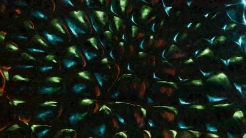 4K Abstract Textured Surface with Shifting Colored Lights Pulsing and Flowi.. Stock Footage 338367475