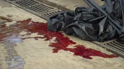4K Accident scene: spilled blood on street pavement Stock Footage