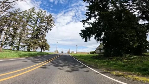 4K action camera footage driving through rural countryside roads in Oregon, USA Video stock 335118634