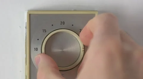 4K Adjusting Thermostat Temperature Dial Turning Stock Footage 50563387