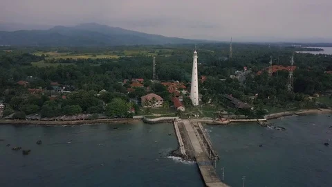 4K Aerial Anyer Lighthouse Fly Back Stock Footage 75705755