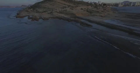 4K Aerial cape view with lighthouse from drone at sunrise Stock Footage 76385254