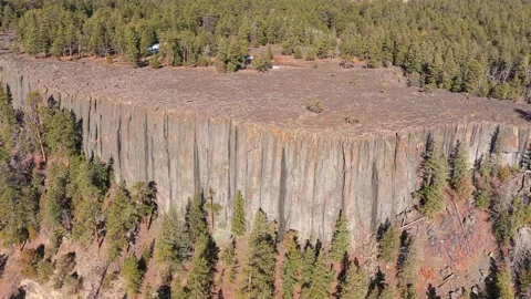 4K Aerial Capture Of Grey Basalt Cliff Face And Plateau Stock Footage 342889790
