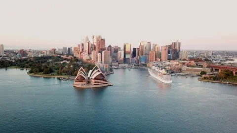 4k aerial cinematic drone footage of Sydney Harbour Bridge during sunrise. Stock Footage