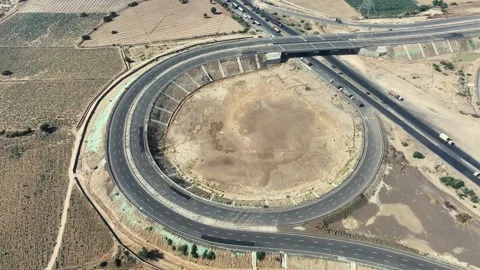 4K Aerial Circular Highway Interchange with Curved Expressway Roads in India Stock Footage 324589944