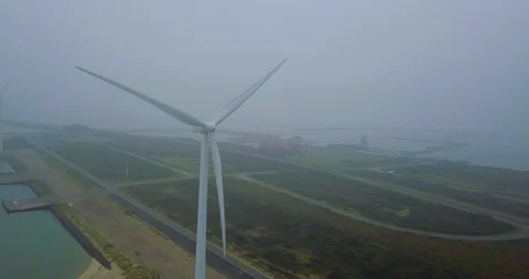 4k Aerial close up shot of a Wind Turbine Generator in The Netherlands Stock Footage 89783229