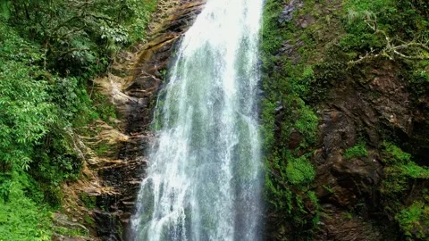 4K Aerial Close-up Vertical Tilt of Waterfall Stock Footage 332385301