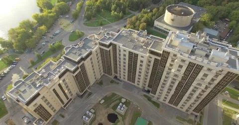 4K aerial construction of multi-storey house residential complex wall hotel Stock Footage 68099943