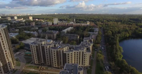 4K aerial construction of multi-storey house residential complex wall hotel Stock Footage 68099946