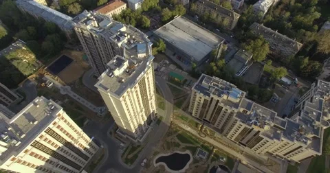 4K aerial construction of multi-storey house residential complex wall hotel Video stock 68099968
