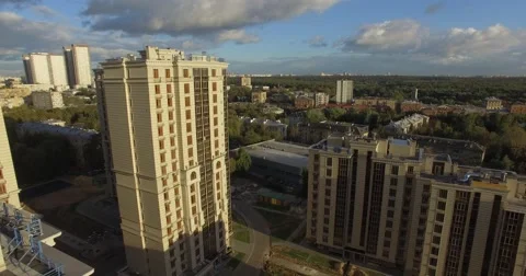 4K aerial construction of multi-storey house residential complex wall hotel Stock Footage 68099983