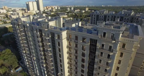 4K aerial construction of multi-storey house residential complex wall hotel Stock Footage 68099988