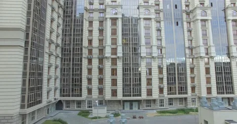 4K aerial construction of multi-storey house residential complex wall hotel Stock Footage 68100145