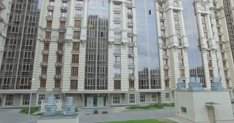 4K aerial construction of multi-storey house residential complex wall hotel Stock Footage 68100182