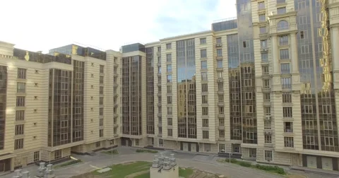 4K aerial construction of multi-storey house residential complex wall hotel Stock Footage 68100188