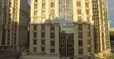 4K aerial construction of multi-storey house residential complex wall hotel Stock Footage 68100199