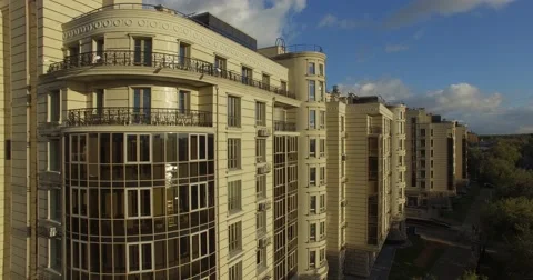 4K aerial construction of multi-storey house residential complex wall hotel Stock Footage 68100217