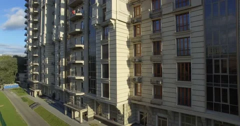 4K aerial construction of multi-storey house residential complex wall hotel Video stock 68100246