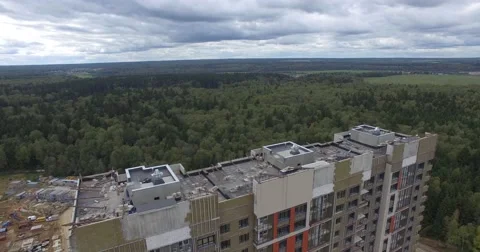 4K aerial construction of multi-storey house residential complex wall hotel Video stock 68376627