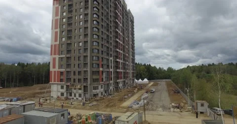 4K aerial construction of multi-storey house residential complex wall hotel Video stock 68376637