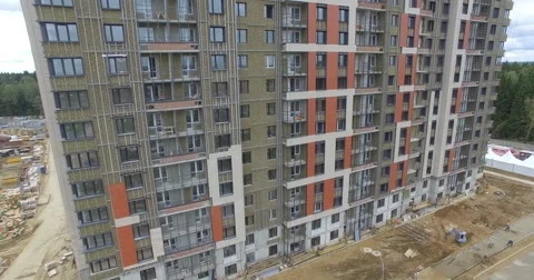 4K aerial construction of multi-storey house residential complex wall hotel Video stock 68376645