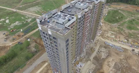 4K aerial construction of multi-storey house residential complex wall hotel Video stock 68378234