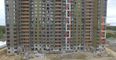 4K aerial construction of multi-storey house residential complex wall hotel Video stock 68378245