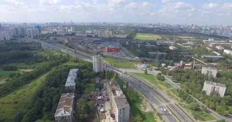 4K aerial construction of multi-storey house residential complex wall hotel Video stock 68773359