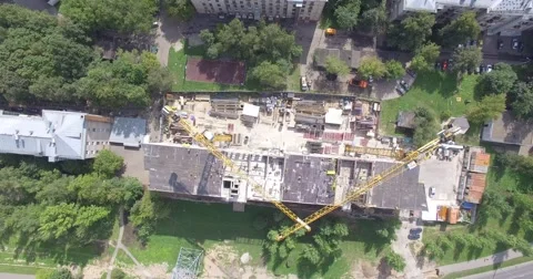 4K aerial construction of multi-storey house residential complex wall hotel Video stock 68773401