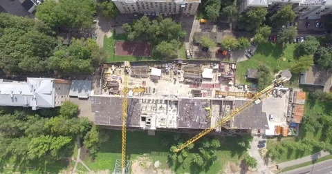 4K aerial construction of multi-storey house residential complex wall hotel Video stock 68773406