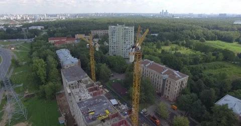 4K aerial construction of multi-storey house residential complex wall hotel Video stock 68773474