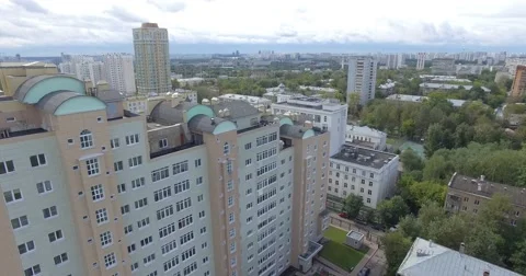 4K aerial construction of multi-storey house residential complex wall hotel Video stock 68773574