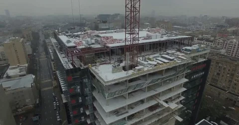 4K aerial construction of multi-storey house residential complex wall hotel Video stock 69174651