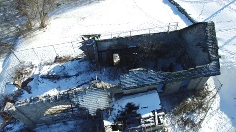 4k aerial crumbling building fenced in Stock Footage 59688459