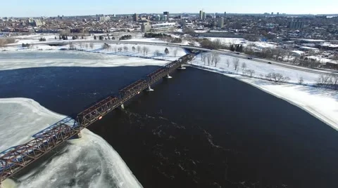 4k aerial descending flight over train bridge Stock Footage 59688976