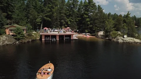4K AERIAL DRONE OF DECK PARTY ON LAKE SUPERIOR Video stock 110772573