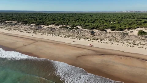 4K Aerial: Drone flight from Atlantic Ocean to Enebrales beach Huelva Spain. Stock Footage 333637533
