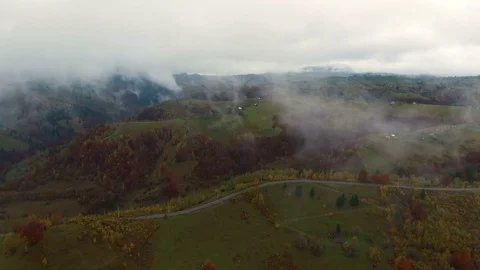 4k aerial drone flight forward to remote houses in the mountains. Stock Footage 78022639