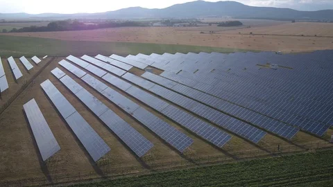 4K Aerial drone flight over modern Solar Panel farm in Europe - shot with color Stock Footage 113286006