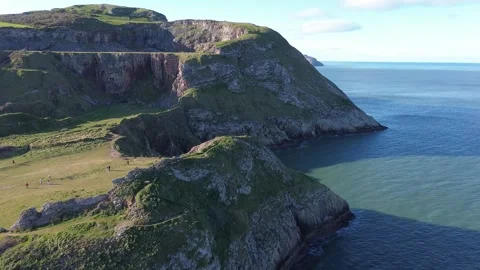 4K aerial drone flight over mountains, ocean and beach with wild animals in Nort Video stock 329617611