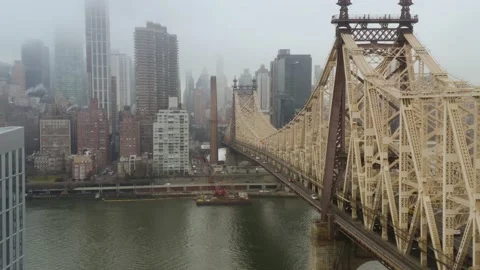 4K Aerial Drone Flyby of Queensboro Bridge Commuters on Misty NYC Morning Stock Footage