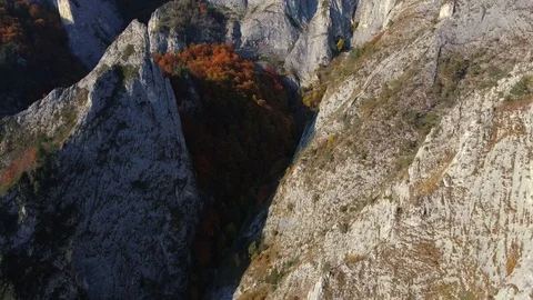 4k aerial drone flying backwards over limestone cliffs. Stock Footage 78632849