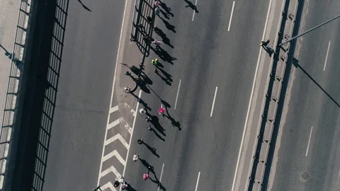 4K Aerial drone fooage. Marathon running on street. Group of support. Camera Stockbeeldmateriaal 89826063