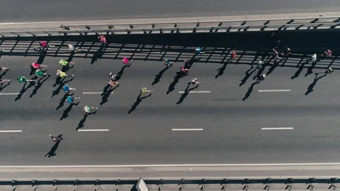 4K Aerial drone fooage. Marathon running on street. Group of athletes. Top view 스톡 동영상 89828299