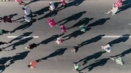 4K Aerial Drone Fooage. Marathon Running On Street. Top View Close Up Stock Footage