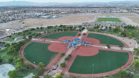 4K Aerial Drone Footage of Desert Breeze Park, Las Vegas Strip in the Distance Stock Footage 328153353